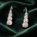 Past present and future moissanite earrings